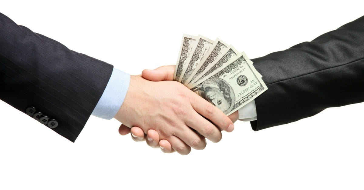 25364-lending-borrowing-money-shake-hands-debt-dollars-business-deal-wide.1200w.tn